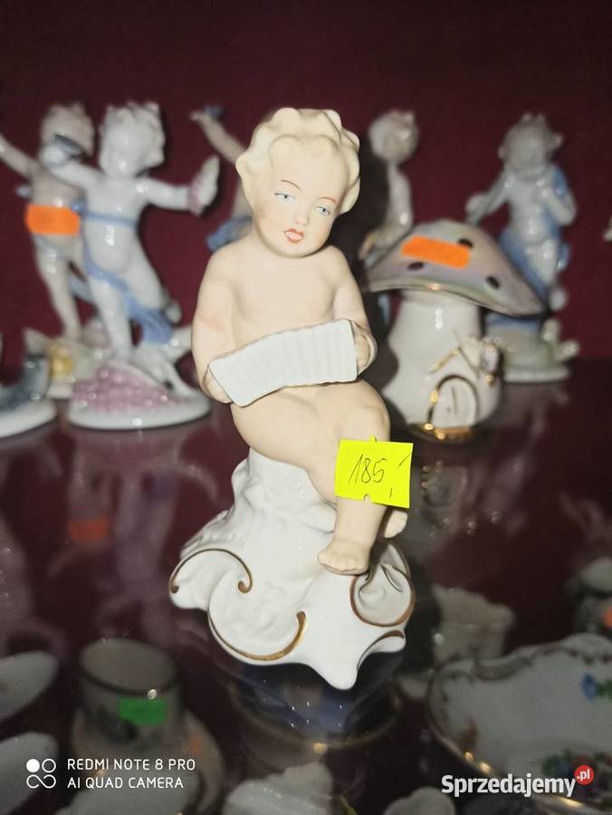 Figurka Puto z harmoszką Sygnatura Schaubach Gdańsk