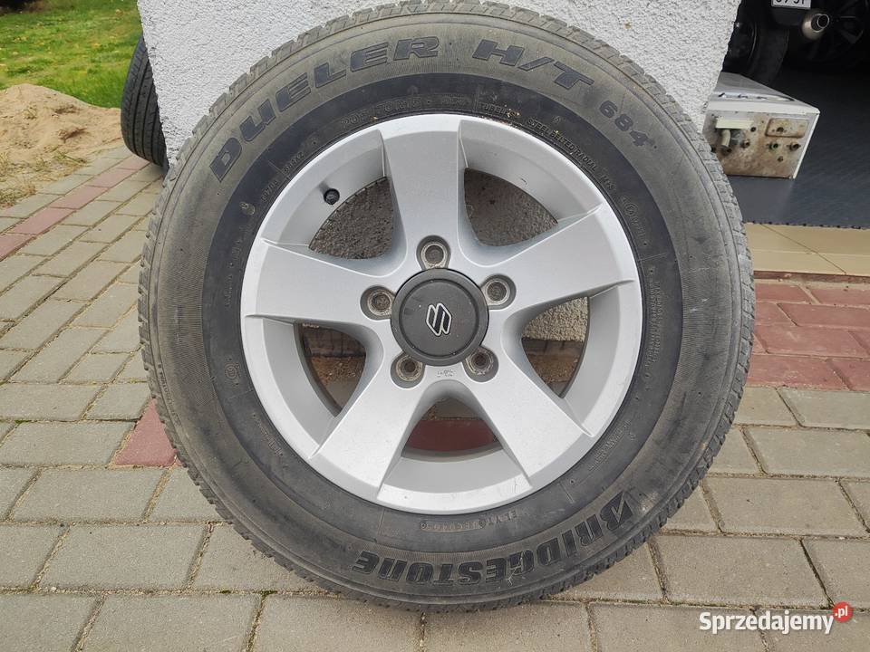 Alufelga 4x4 15 20570 R 15 z opona Bridgestone