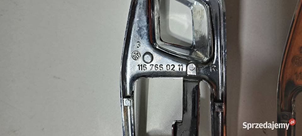 Ramka klamki wewnętrznej prawy przód 1167660211 osobowe Luzino