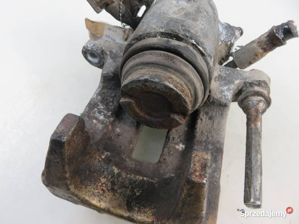 ZACISK LEWY TYŁ SEAT TOLEDO II 19 TDI sprzedam
