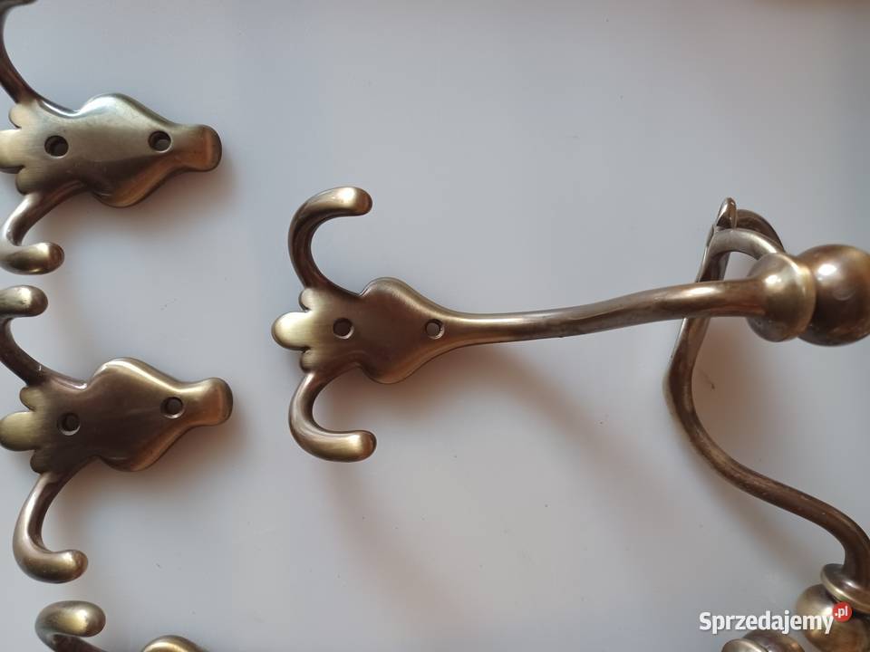 Ładny komplet masywnych wieszaków Mosiądz Poznań sprzedam