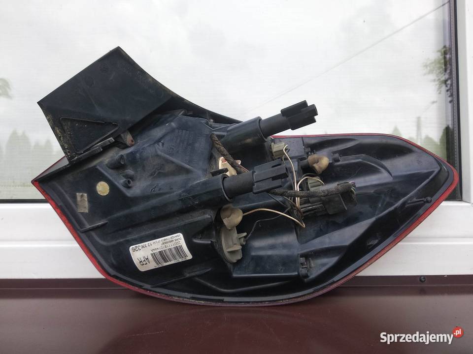 Opel Astra J kombi lampa tył tylna lewa narożna