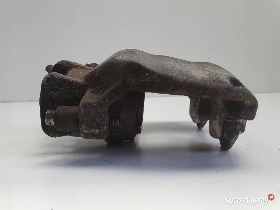 Volvo S80 I PRZEDNI ZACISK HAMULCOWY lewy przód osobowe Chełm