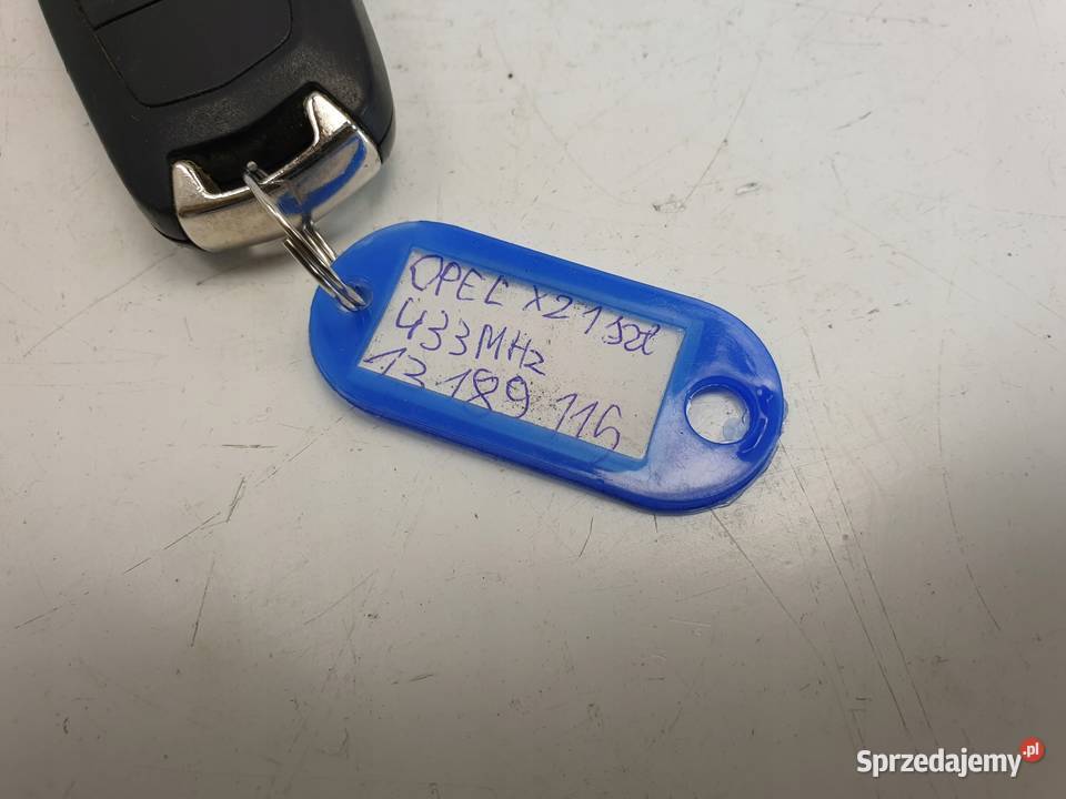 KLUCZYK OPEL 13189115 Rudka