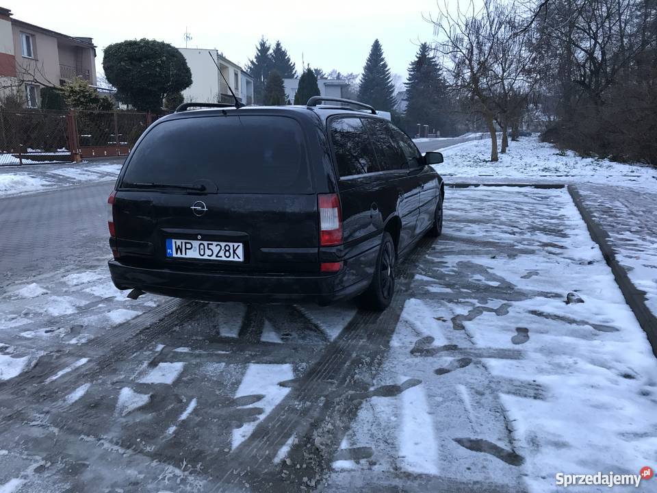 Omega B FL 25 DTI CR BMW 150 zamiana reflektory ksenonowe