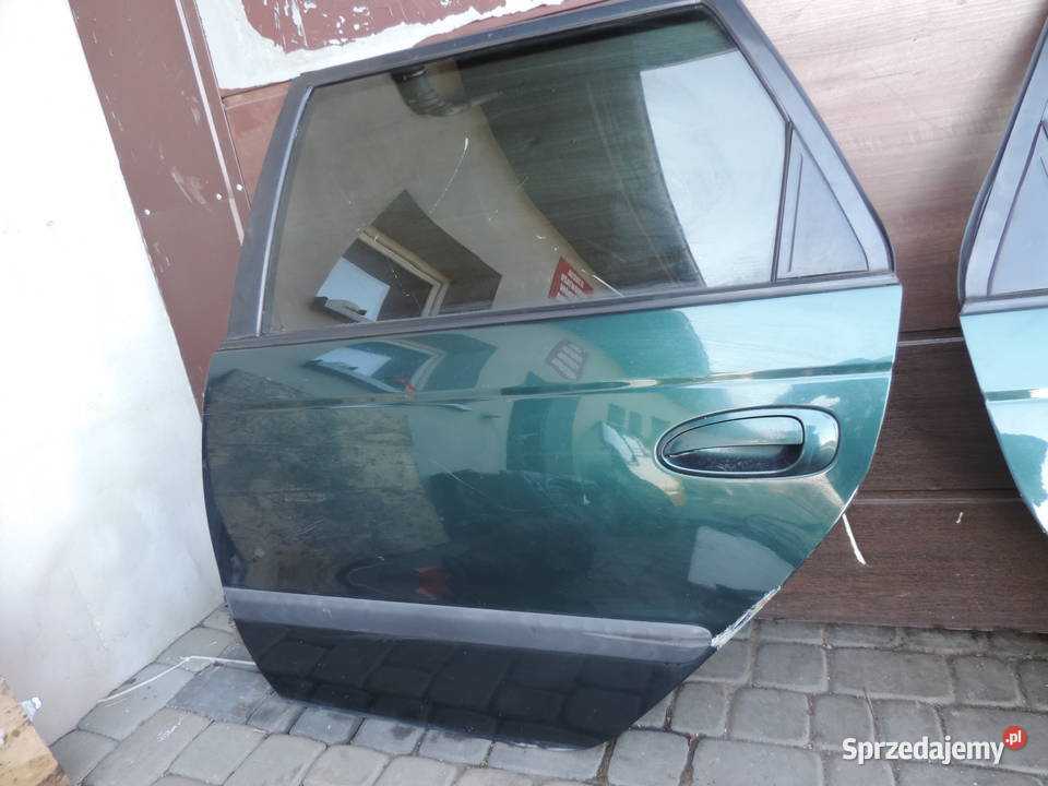 DRZWI LEWY TYŁ AVENSIS T22 6S3 KOMBI Części samochodowe Nowy Sącz