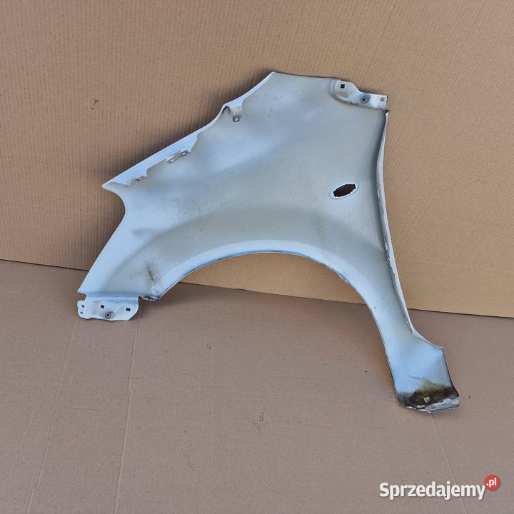 SUZUKI SPLASH BŁOTNIK PRAWY PRZÓD osobowe Bieleń