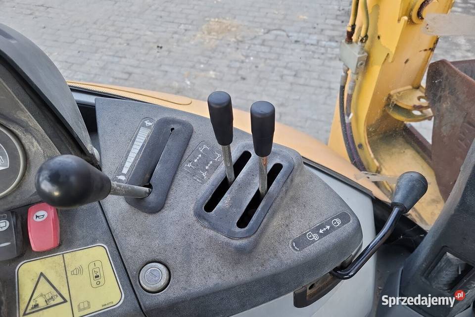 Caterpillar 428F Słowik