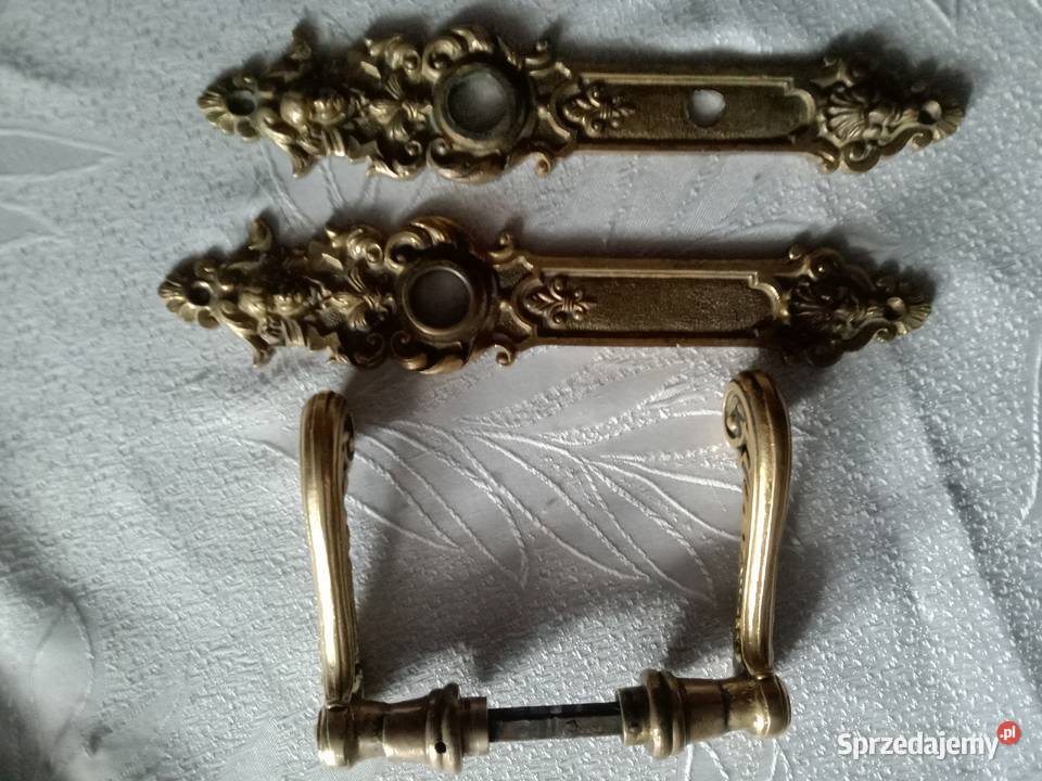 Stare mosiężne ozdobne klamki do drzwi