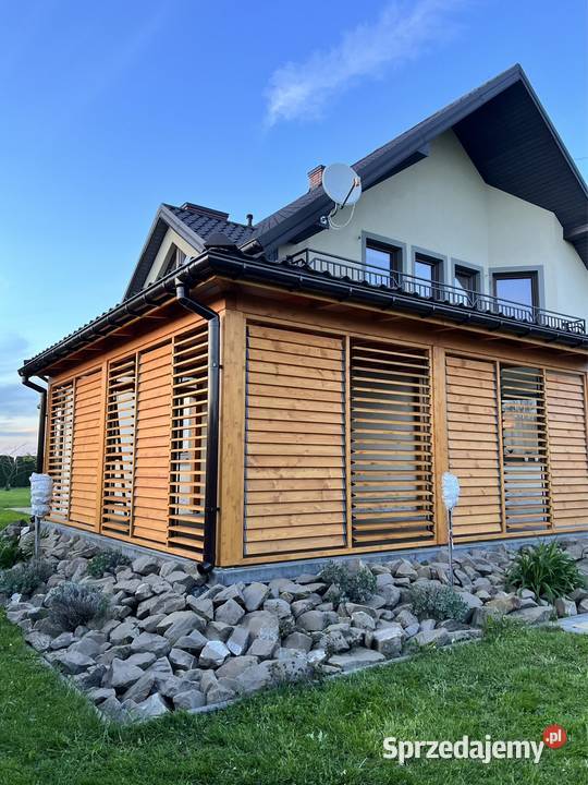 Ruchome żaluzje drewniane ruchome deseczki Architektura ogrodowa Pilzno