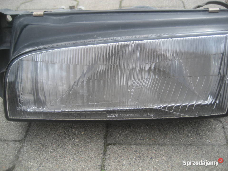 mazda 323 8993r lampy przód prawa lewa Rakoniewice