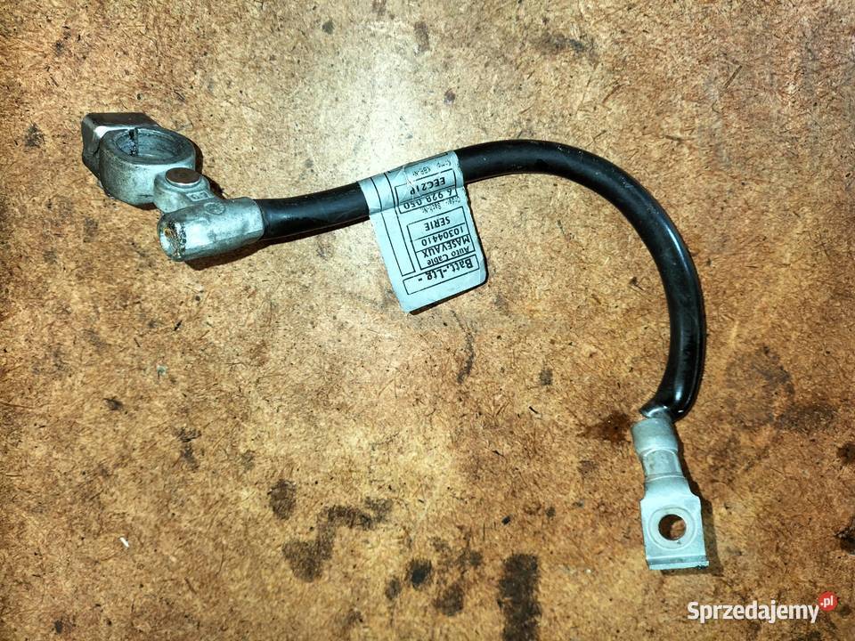 Klema minusowa akumulatora w bagażniku BMW E65 osobowe Poręba