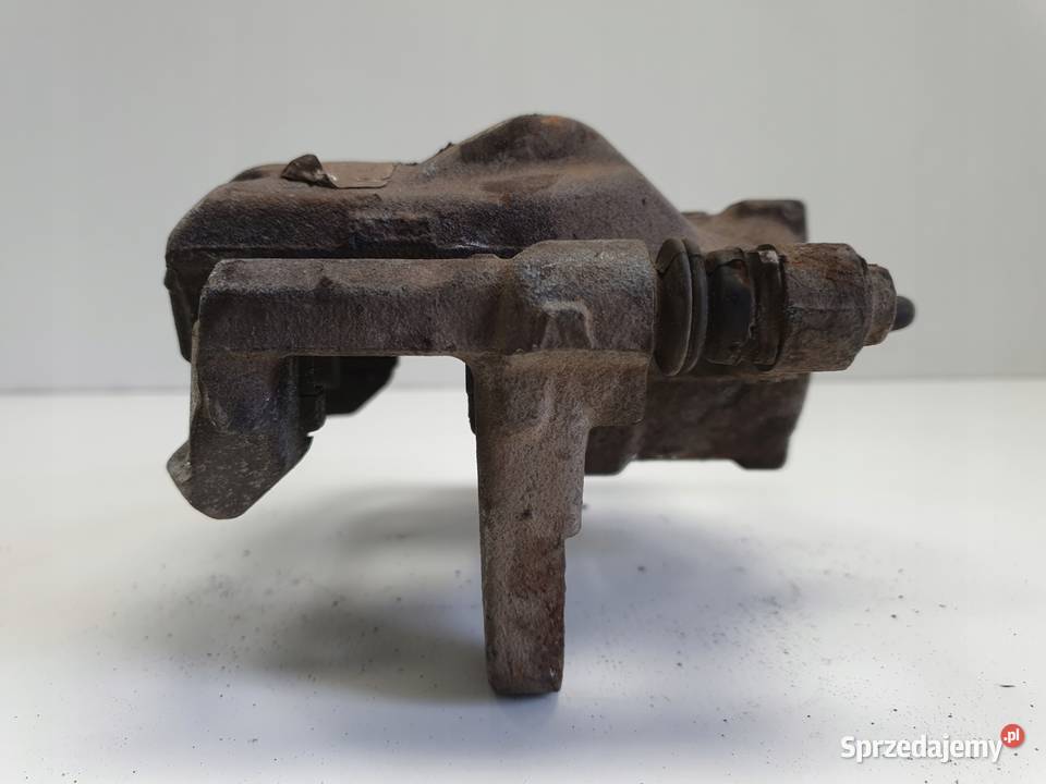 Toyota Corolla XII E21 PRZEDNI ZACISK HAMULCOWY osobowe Rudka