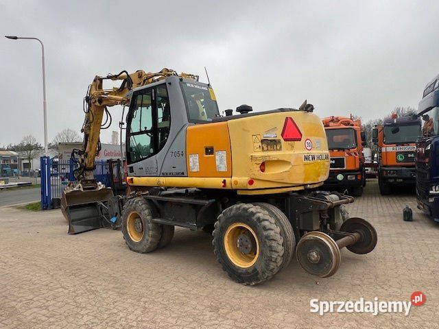 Koparka kolowa kolejowa Holland MH plus2 Warszawa