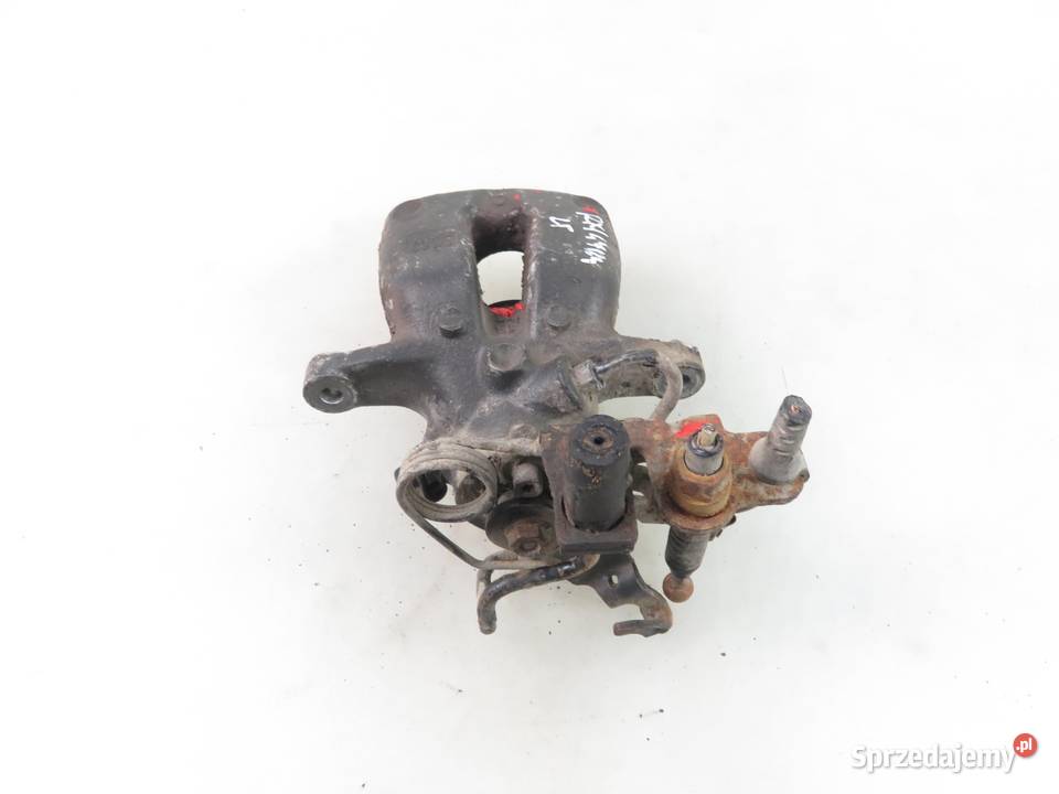 ZACISK LEWY TYŁ VW CADDY III