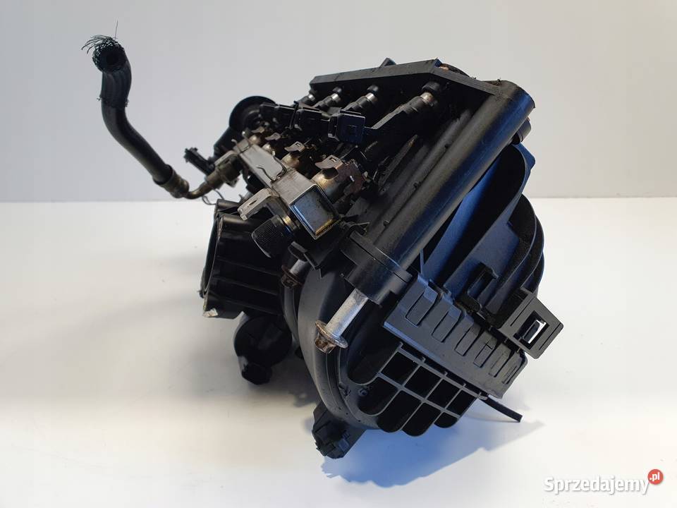 Opel Corsa C 12 16V KOLEKTOR SSĄCY 0280600046 Rudka