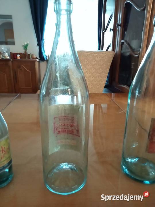 Butelki przedwojenne z okupacji z etykietami Łódź