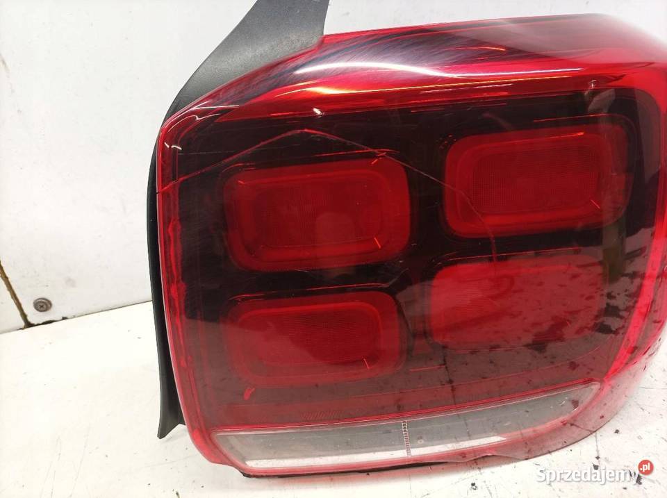 LAMPA TYŁ PRAWA EU USZKODZONA 265505695R Dacia
