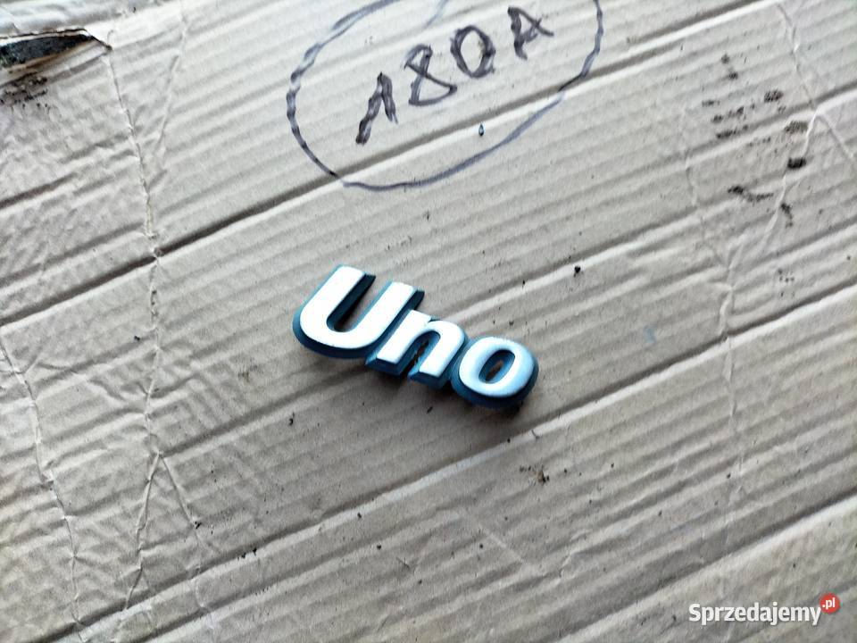 UNO ZNACZEK EMBLEMAT NAPIS Kamień-Kolonia