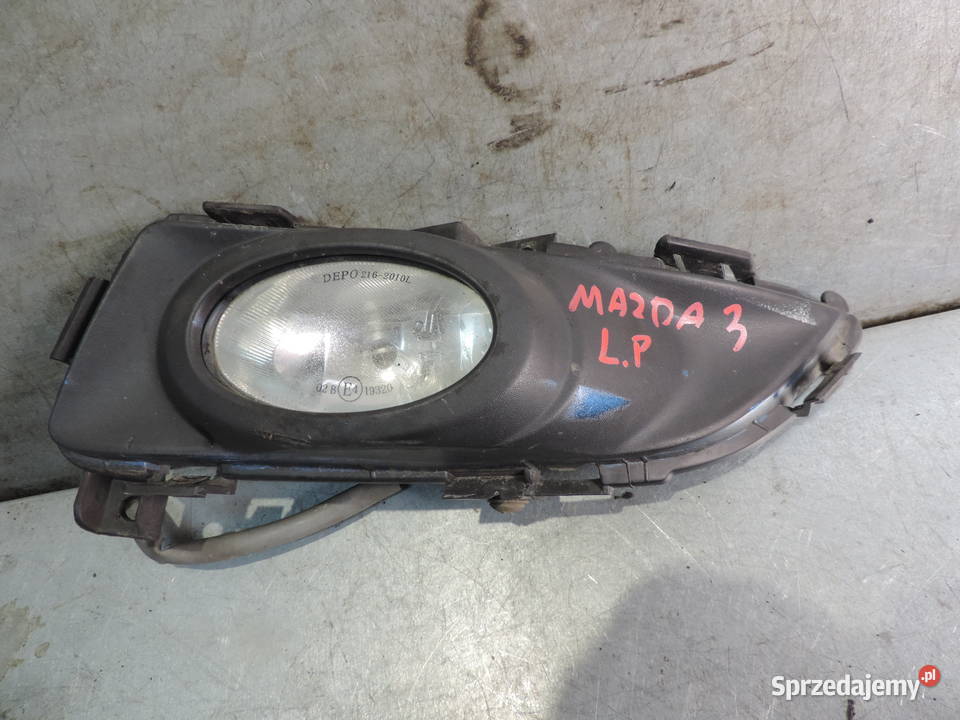 MAZDA 3 BK HALOGEN LEWY RAMKA Lampy przeciwmgielne Oświetlenie Nowy Sącz