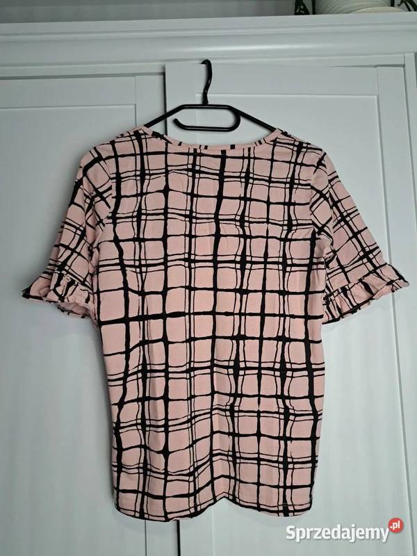 Stylowa różowa bluzka Carry Casual z modnym Trąbki Wielkie