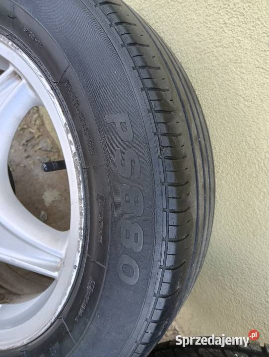 Felgi aluminiowe z oponami Opel 18565 R15 łódzkie Rząśnia