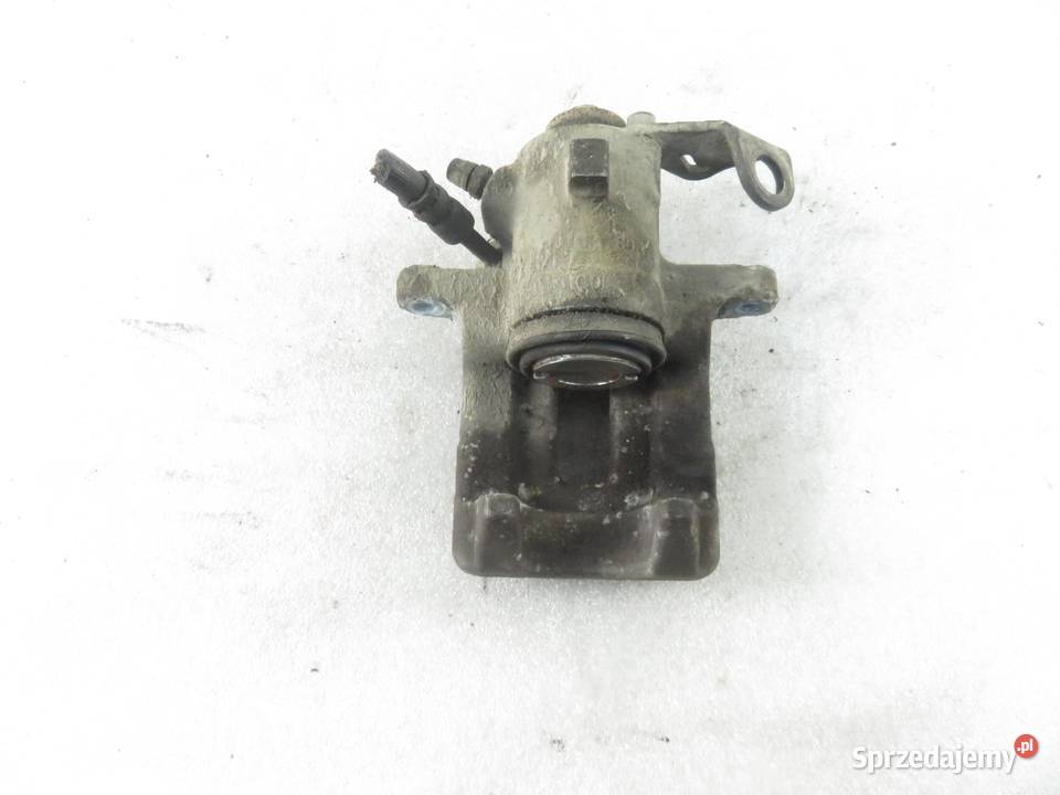 ZACISK PRAWY TYŁ SKODA FABIA I 14 osobowe