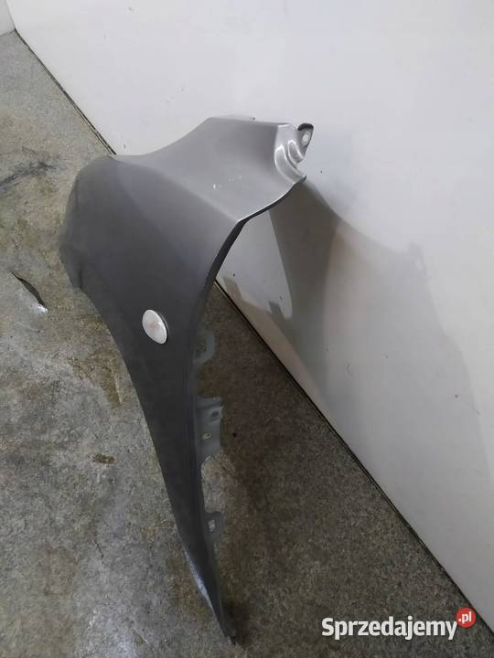 BŁOTNIK LEWY PRZÓD SZARY Suzuki Baleno II