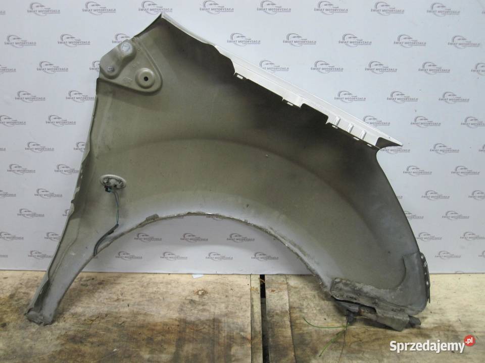 CITROEN BERLINGO II 11r błotnik lewy przód