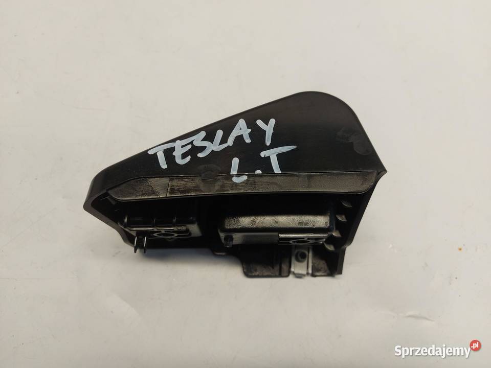 TESLA MODEL Y 2024r ŚLIZG WSPORNIK LAMPY LEWY