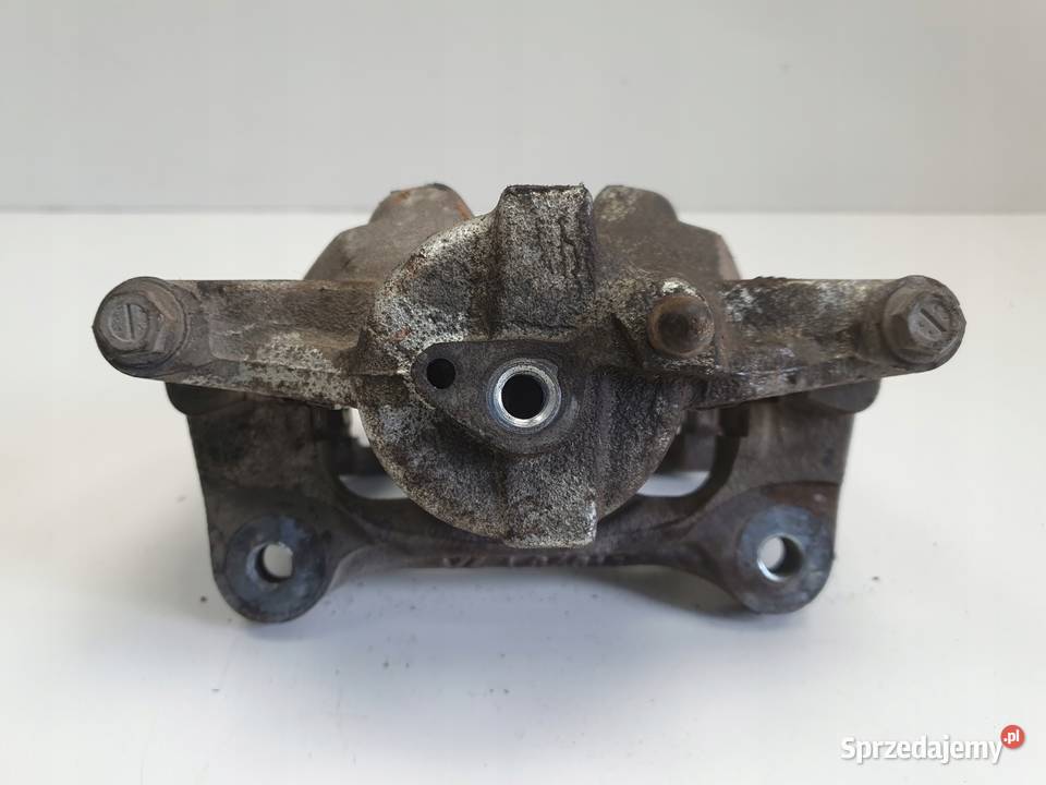 Toyota Corolla XII E21 PRZEDNI ZACISK HAMULCOWY Rudka