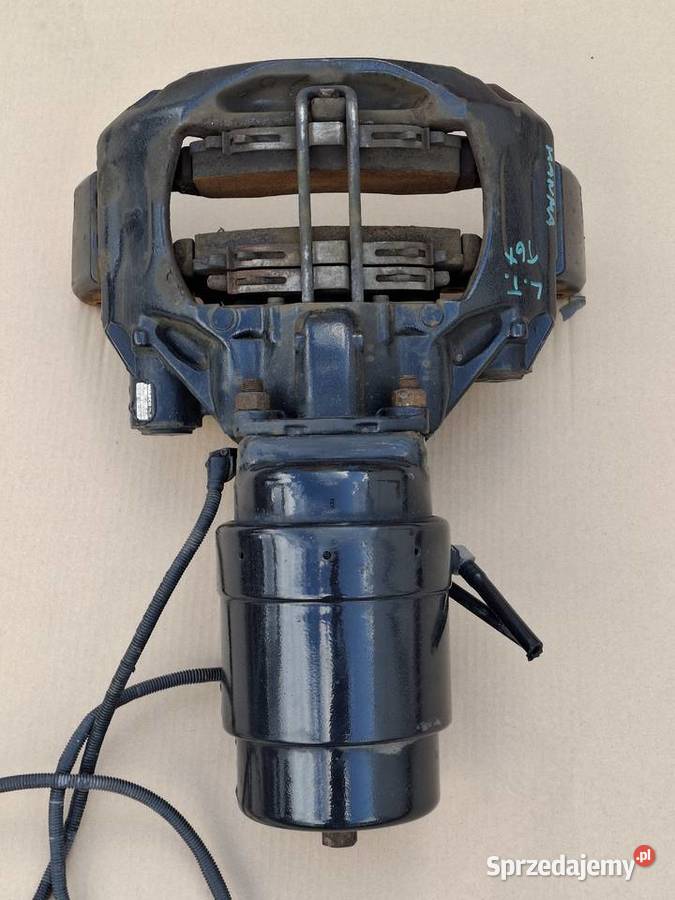 MAN TGX EURO 6 ZACISK HAMULCOWY LEWY TYŁ Bieleń