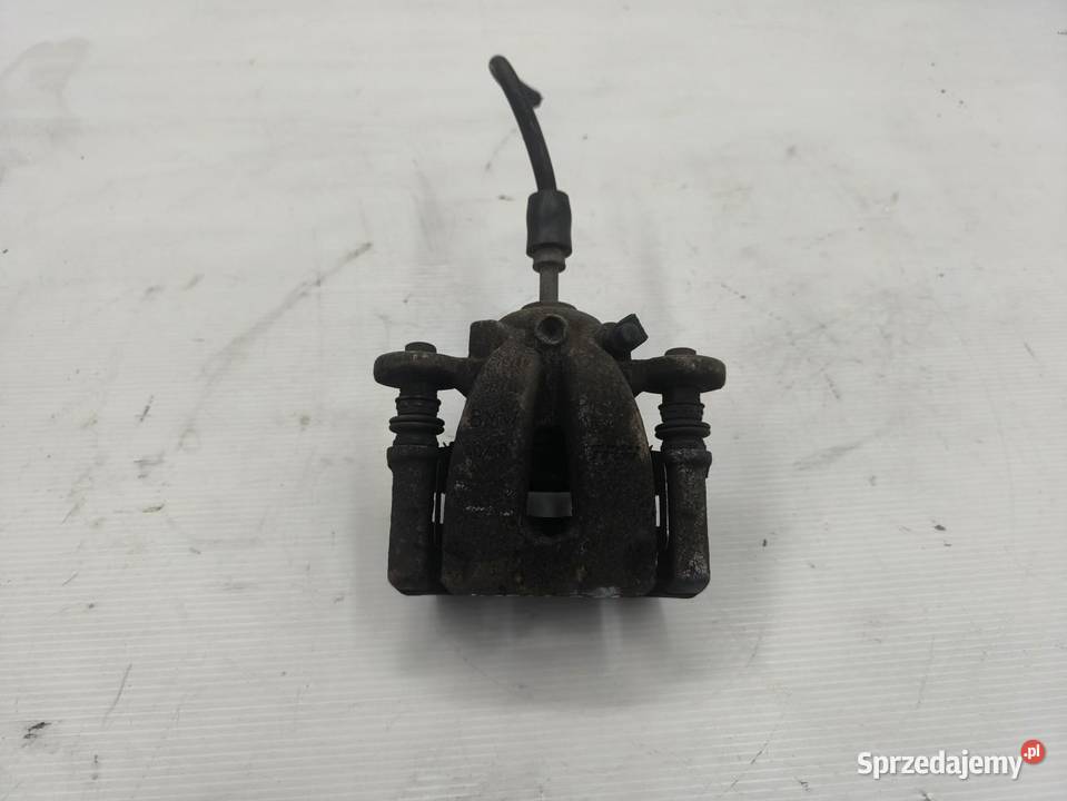 ZACISK PRAWY PRZÓD BMW 1 E87 E81 LIFT 16