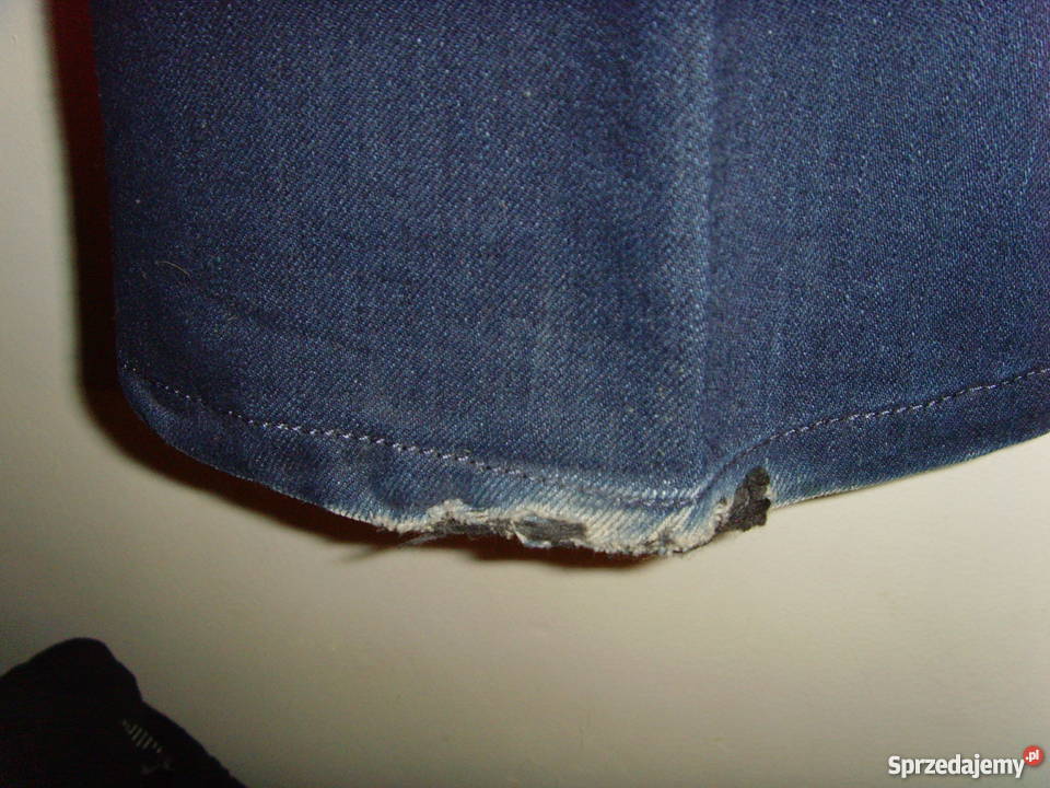 Jeansy Denim firmy Bershka rozszerzane u dołu Bershka mazowieckie Warszawa