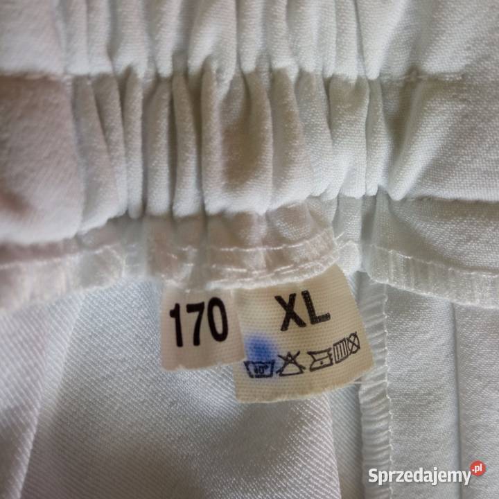 Eleganckie białe spodnie na kant r 42 Koszalin