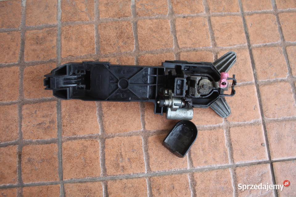 KLAMKA DRZWI LEWY PRZÓD Z11 NISSAN NOTE E11