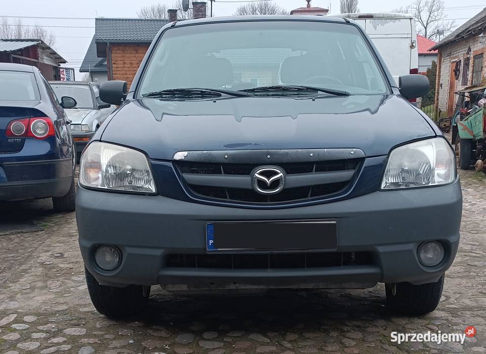 MAZDA TRIBUTE 4x4 zdrowa światła przeciwmgielne Osieck