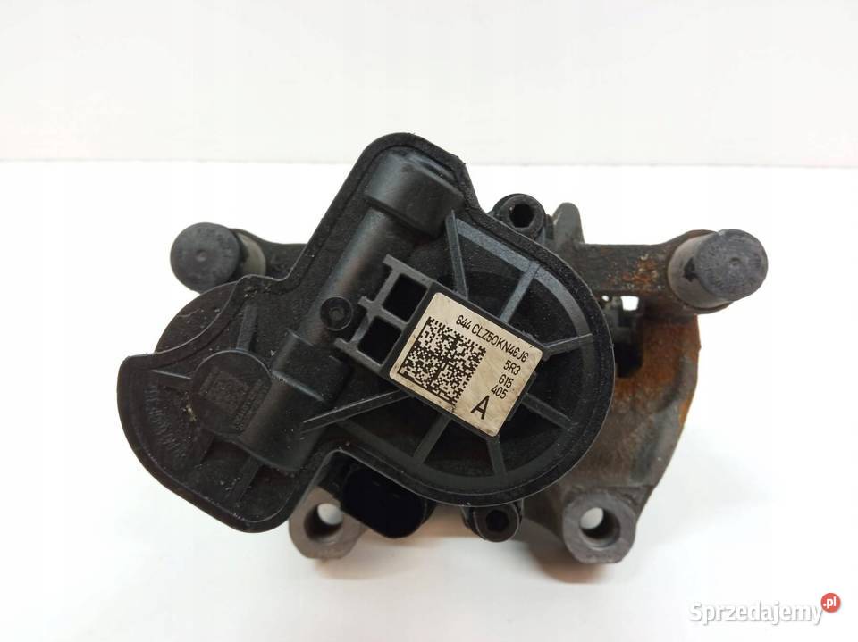 ZACISK HAMULCOWY LEWY TYŁ 5R3615405A Skoda