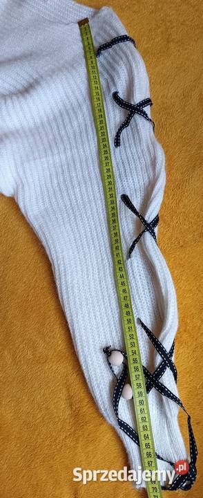Sweterek biały z ozdobnym wiązaniem na rękawach Rozmiar 50