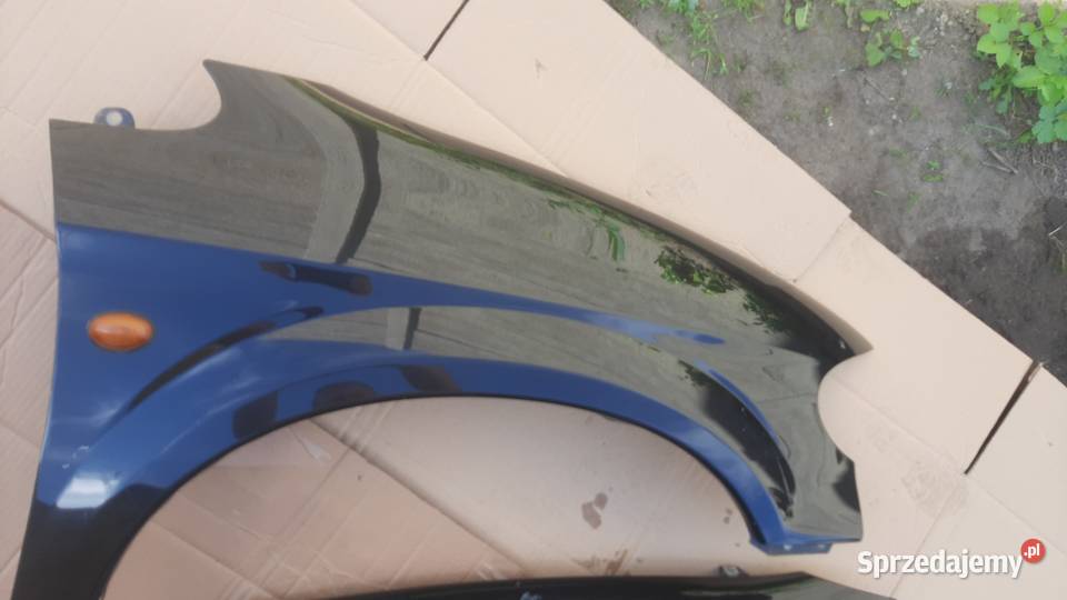 błotnik prawy lewy Chrysler Voyager IV czarny Dębno