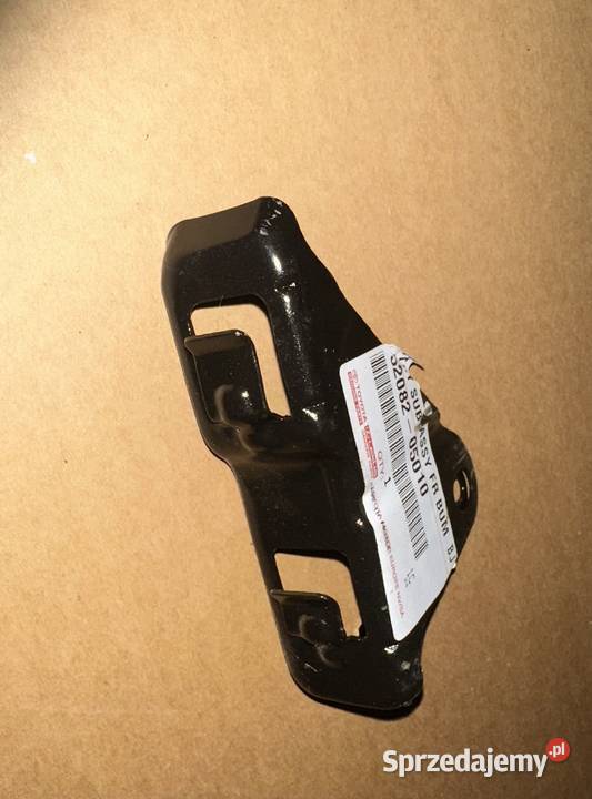AVENSIS T25 0306 UCHWYT MOCOWANIE LAMPY ZDERZAK osobowe Karoseria