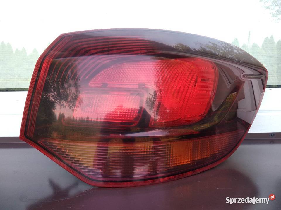 Opel Astra J kombi lampa tył tylna prawa narożna Sieradz
