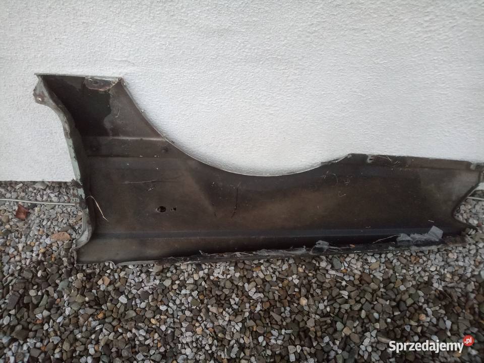 Polonez CaroAtu Błotnik przedni oryginalny