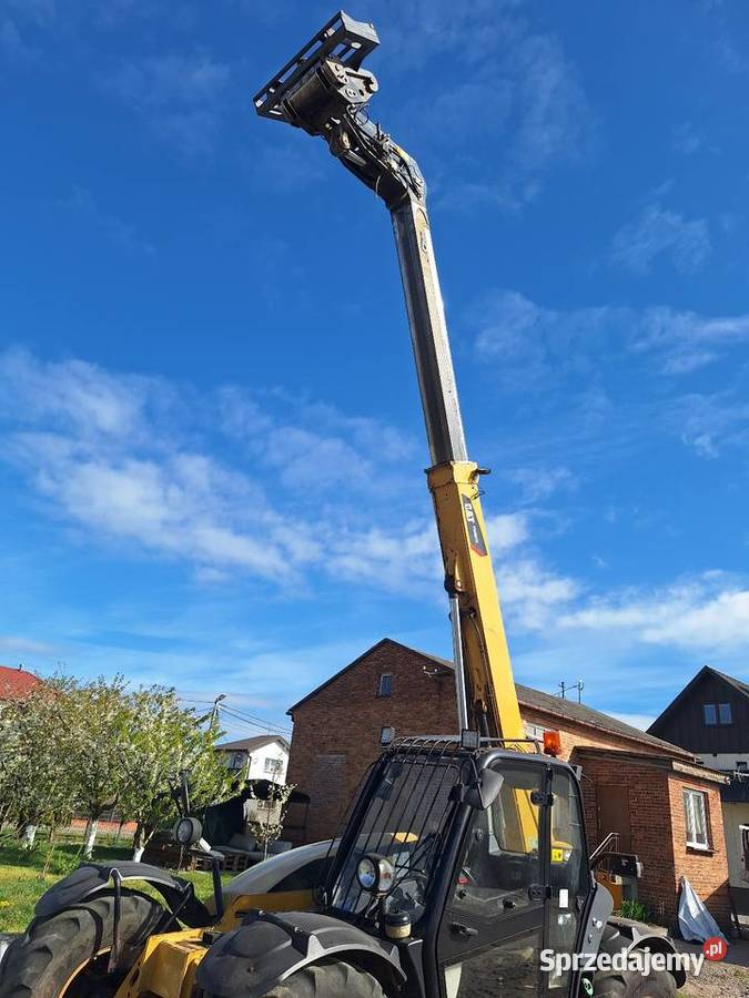 Ladowarka teleskopowa Caterpillar TH407C 2015 Kabina Parczew sprzedam