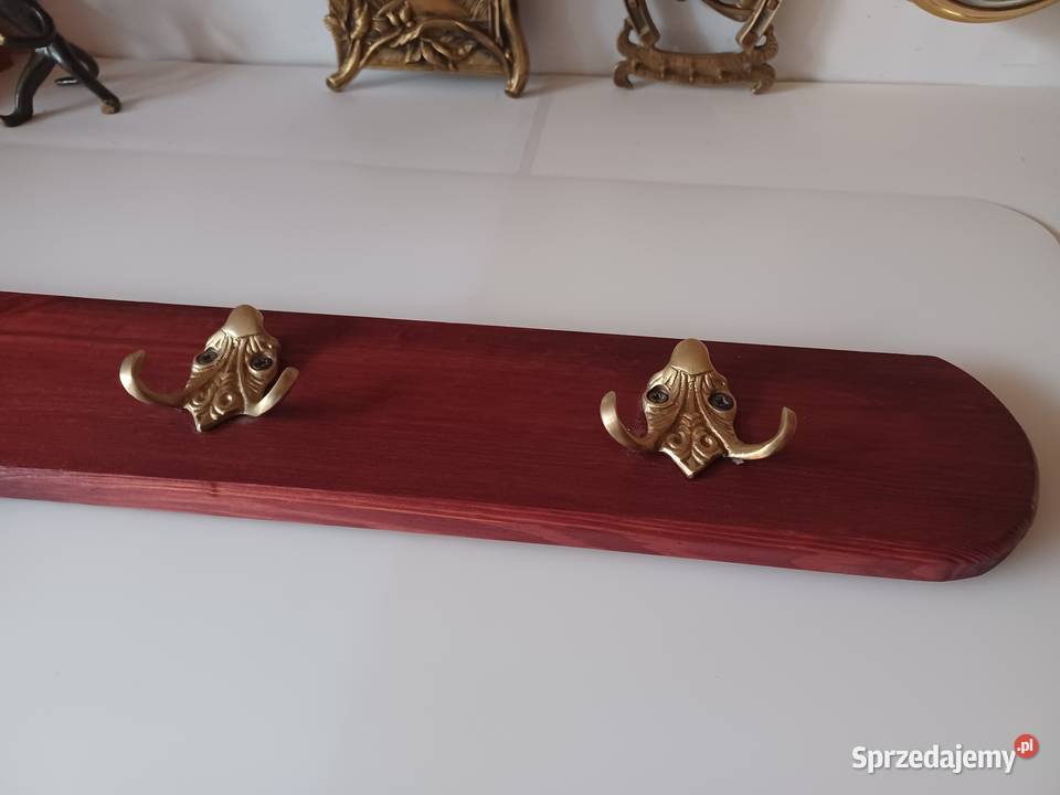 Mosiężne masywne piękne wieszaki na desce wielkopolskie Poznań sprzedam