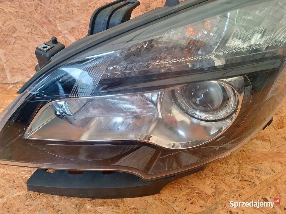 LAMPA LEWY PRZÓD REFLEKTOR EU XENON OPEL MOKKA osobowe