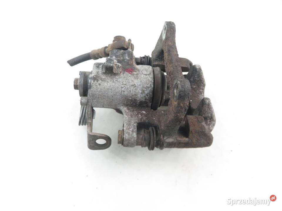 ZACISK LEWY TYŁ AUDI A4 B7 20 TDI