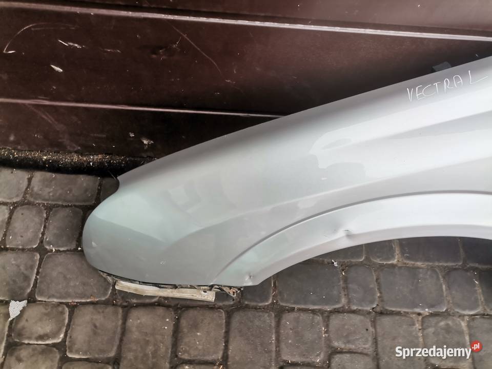 BŁOTNIK LEWY PRZÓD OPEL VECTRA C Z157 Karoseria Nowy Sącz