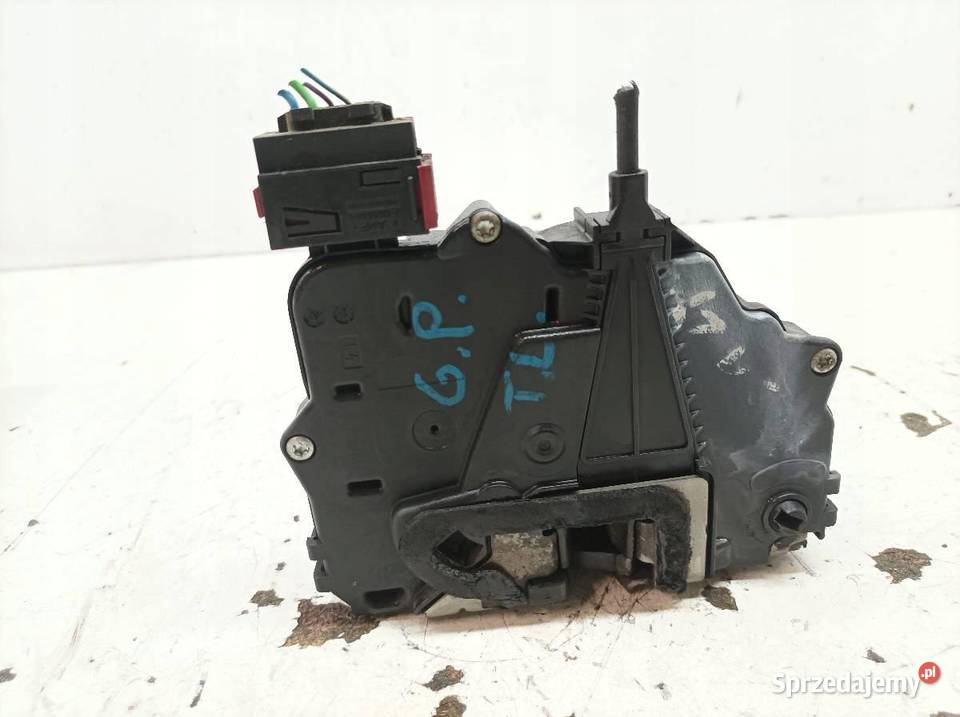 ZAMEK DRZWI TYŁ LEWY 55701969 Fiat Grande Punto