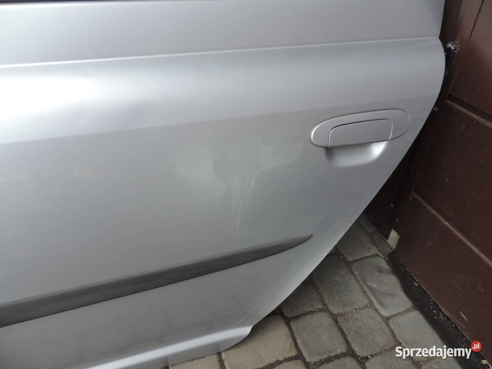 TOYOTA YARIS I 5D FL DRZWI LEWY TYŁ 1E7